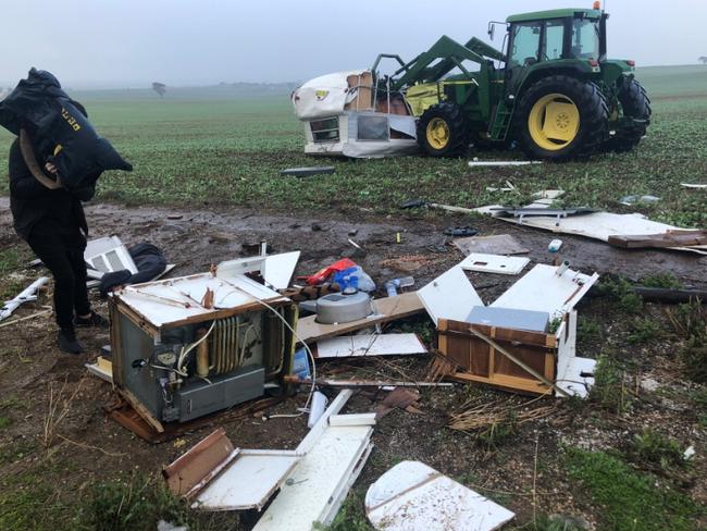 A caravan has rolled into a paddock on Callington Road , Strathalbyn in the high winds today . CREDIT : Nine News