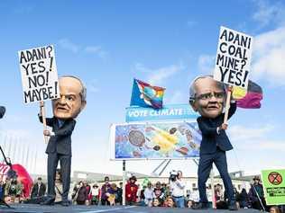 Protestors dressed as Scott Morrison and Bill Shorten during the anti-Adani Rally outside Parliament House in Canberra. Picture: ROHAN THOMSON