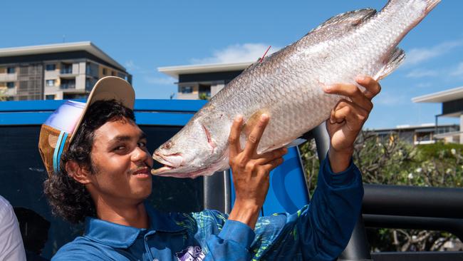 Keegan Payne with his million dollar barra. Picture: Pema Tamang Pakhrin