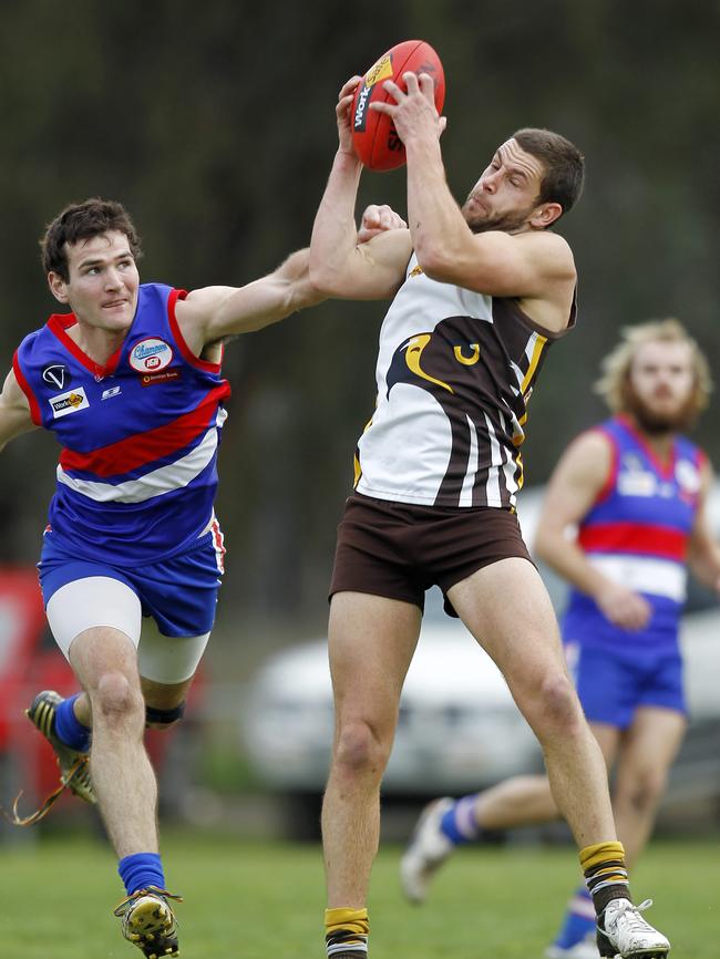 Heathcote District: Huntly’s Ryan Semmel (pictured marking the ball) won his second Cheatley Medal in 2016 to go alongside his win in 2013. Picture: Yuri Kouzmin