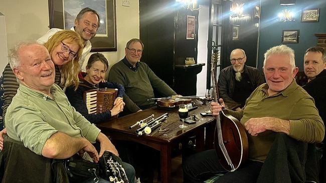 Kate Kulas and George Goulburn with the Scottish band: Kate sang Danny Boy on their last night.