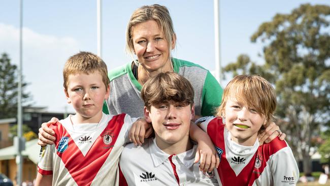 Harbord Devils Junior Rugby League players Max Crotty-King (17), Noah Smith (7) Astin Smith (9) and their Mum Amy Smith. Picture: Julian Andrews.