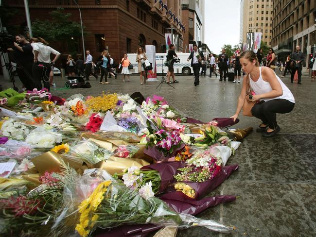 Many Sydneysiders joined the Premier in laying flowers at the memorial. Picture: Adam Ward