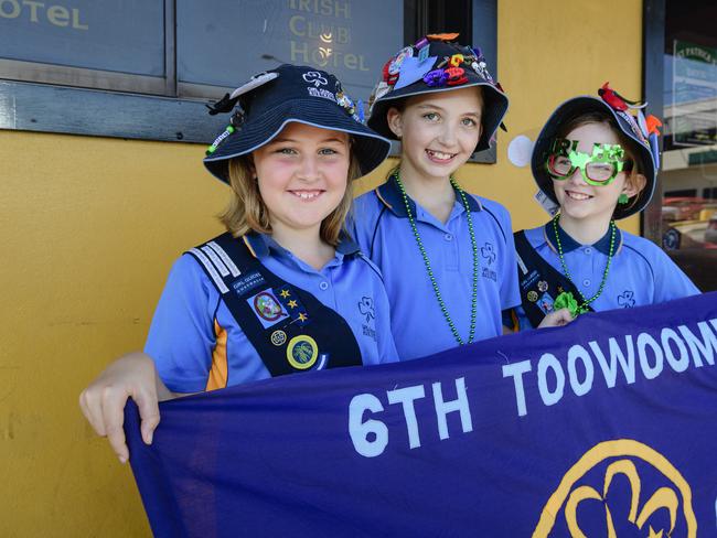 Members of the Harristown Girl Guides (from left) Ruby Bolitho, Evie Williams and Elana South after marching in the Darling Downs Irish Club St Patrick's Day parade, Sunday, March 16, 2025. Picture: Kevin Farmer