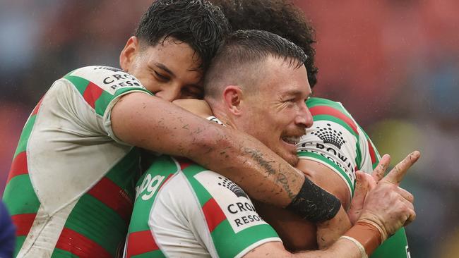 BRISBANE, AUSTRALIA - MAY 14: Damien Cook of the Rabbitohs   celebrates a try during the round 10 NRL match between the New Zealand Warriors and the South Sydney Rabbitohs at Suncorp Stadium, on May 14, 2022, in Brisbane, Australia. (Photo by Chris Hyde/Getty Images)