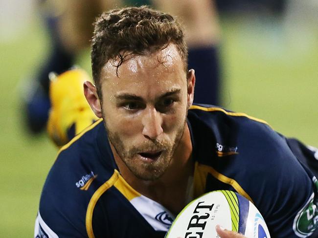 CANBERRA, AUSTRALIA - FEBRUARY 13: Nic White of the Brumbies scores a try during the round one Super Rugby match between the Brumbies and the Reds at GIO Stadium on February 13, 2015 in Canberra, Australia. (Photo by Stefan Postles/Getty Images)