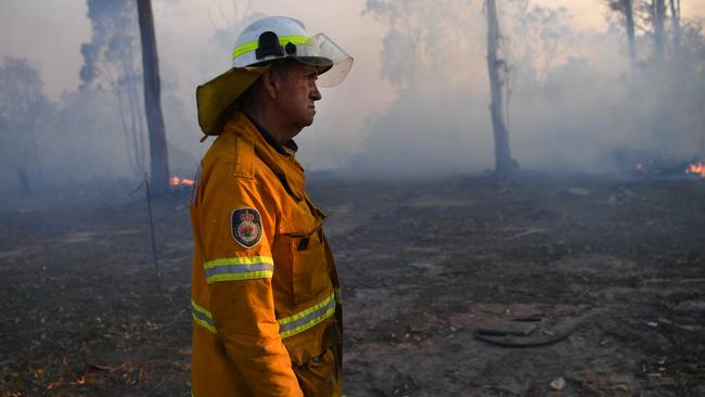 NSW Rural Fire Service volunteer Bob Kneipp, after successfully defending a property in Torrington, near Glen Innes. Picture: AAP.