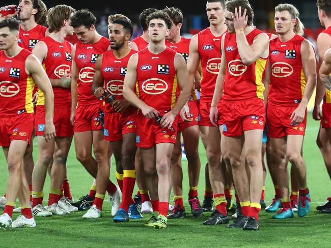 GOLD COAST, AUSTRALIA - JULY 17: The Suns are seen after they were defeated by the Bulldogs during the round 18 AFL match between Gold Coast Suns and Western Bulldogs at Metricon Stadium on July 17, 2021 in Gold Coast, Australia. (Photo by Chris Hyde/AFL Photos/via Getty Images)