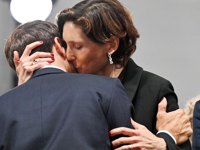 The President’s embrace with his Sports Minister raised eyebrows. Picture: Agence KMSP/KMSP/KMSP via AFP