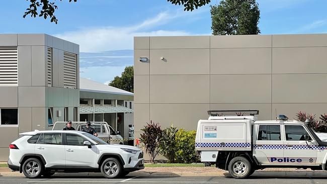 Police officers stand guard outside Peace Lutheran College in Kamerunga after 18-year-old student Melody Neal was allegedly stabbed by Marc Rajan Taylor. Picture: Isaac McCarthy