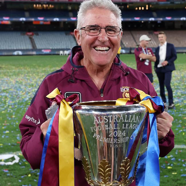 MELBOURNE , AUSTRALIA. SEPTEMBER 28, 2024. AFL Grand Final between the Sydney Swans and the Brisbane Lions at the MCG. Chris Fagan coach of the Brisbane Lions on the empty MCG with the cup. Picture: Mark Stewart