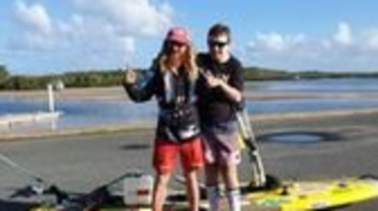 TWO AMAZING JOURNEYS: Walking on water is what it looks like from a distance, but anti-pollution campaigner Ben Ferris is paddling his stand-up paddle board up Australia's east coast, with the admiring support of Rainbow Beach legend, Tristan Sik, who is on his own journey back to wellness after being badly injured in a road crash.