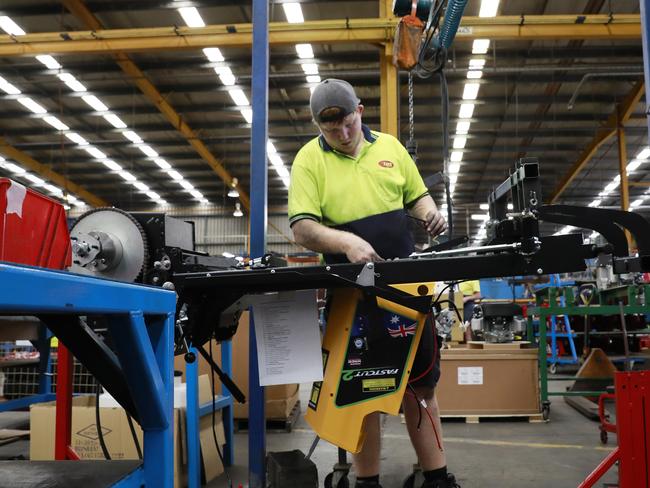 The production line at Cox Mowers manufacturing factory in Acacia Ridge, Brisbane on Thursday, March 7, 2019. Cox Mowers rescued Greenfield mowers from bankruptcy. (AAP Image/Claudia Baxter)