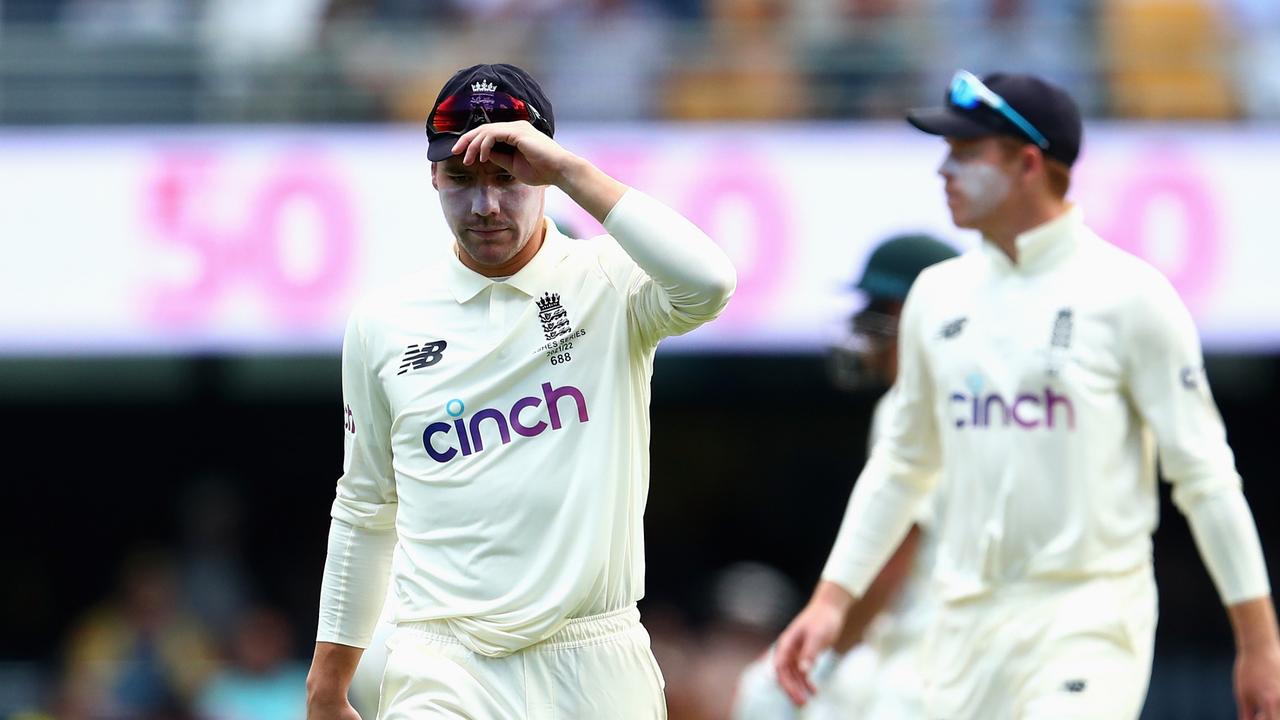 Rory Burns of England looks dejected after dropping a catch to dismiss David Warner. Photo by Chris Hyde/Getty Images