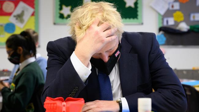 Boris Johnson speaks with pupils in a maths class as he makes a constituency visit to Oakwood School earlier this month. Picture: Getty Images