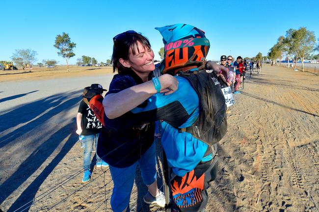 There were hugs all around after the 2019 Tatts Finke Desert Race. Pic: MATT HENDERSON