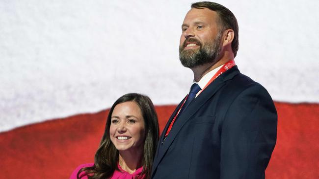 Sen. Katie Britt is seen onstage at the Fiserv Forum with her husband Wesley Britt. Picture: AFP