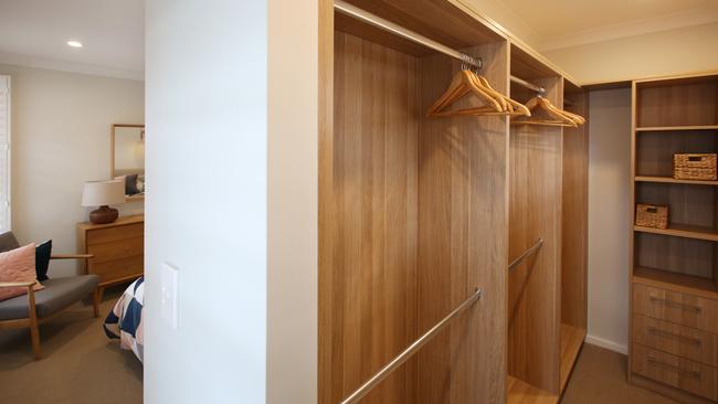 The master bedroom includes two walk-in robes.