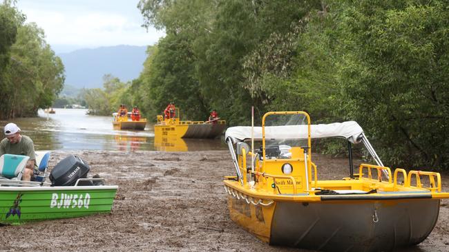 SES boats muster at the end of Wisteria St in Holloways Beach. Picture: Peter Carruthers