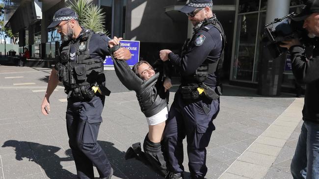 Extinction Rebellion spokesman and environmental activist Eric Herbert had to be removed from by police after refusing to move on.