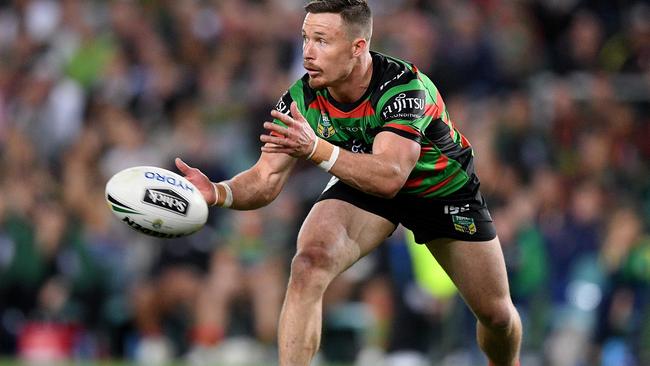 Damien Cook of the Rabbitohs passes the ball during the NRL Preliminary Final