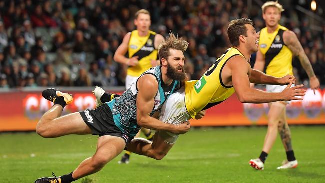 Justin Westhoff tackles Alex Rance of Richmond on Friday night. Picture: Daniel Kalisz/Getty Images