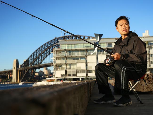 Fisherman Andy Law throws a line in from Pier 8 most afternoons and says “no way” to the proposed ban. Picture: Sam Ruttyn