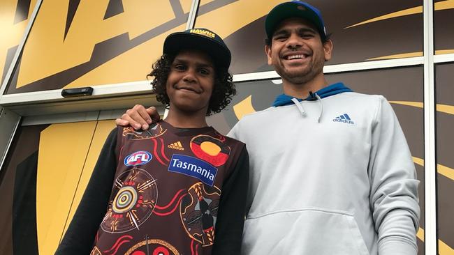 Cebby Johnson with AFL great Cyril Rioli