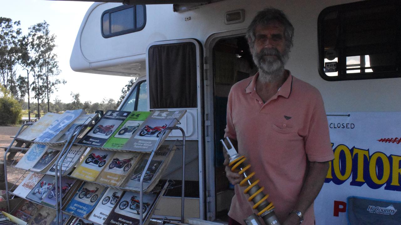 SWAP MEET: Ross Ellis from Tiaro displays motorcycle parts and manuals he was selling at the Maryborough swap meet. Photo: Stuart Fast