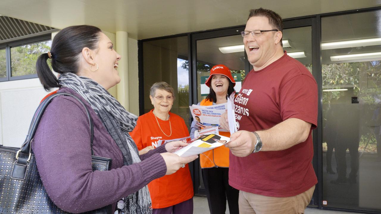 NRL great and former senator Glenn Lazarus handed out how to vote flyers to a voter at Ipswich Humanities Centre where it was used as a polling booth during the 2016 election.