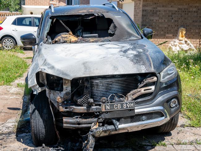 A Mercedes Benz vehicle has been set on fire at a property in Wetherill Park overnight. Picture: Thomas Lisson