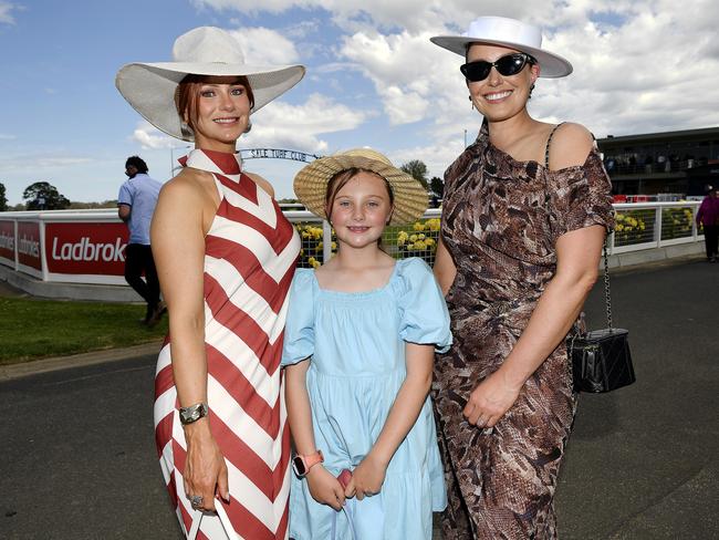 Ladbrokes Sale Cup. Racegoers are pictured attending Cup Day horse races at Sale Turf Club, Sunday 27th October 2024. Keegan O’Brien, Evie and Sarah Churchill. Picture: Andrew Batsch