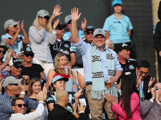 Prime Minister of Australia Scott Morrison waves to the crowd on arrival to the Cronulla v Manly NRL match at PointsBet Stadium, Cronulla. Picture: Brett Costello