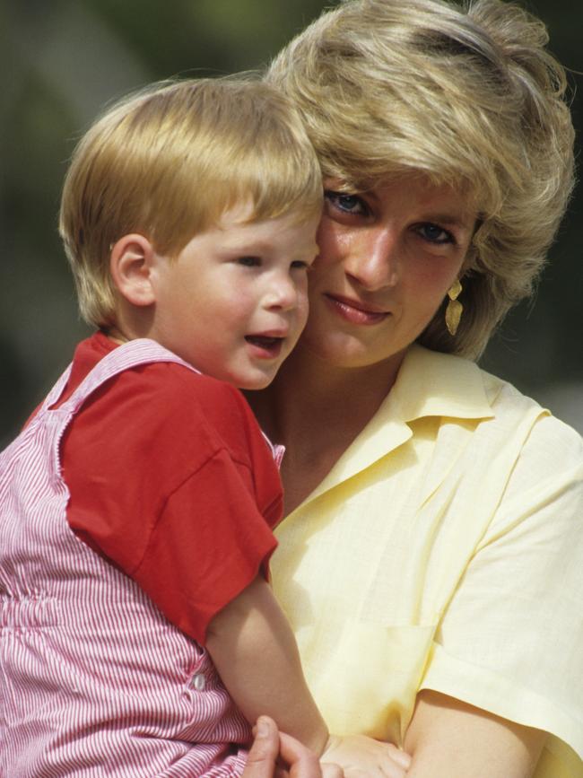 Princess of Wales with Prince Harry on holiday in Majorca, Spain in 1987. Picture: Getty Images.