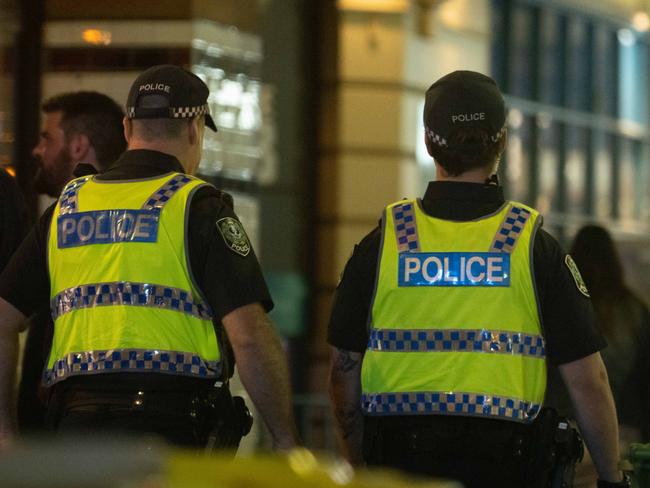 Police presence can be seen along Hindley Street on a Friday night in Adelaide, Kaurna Yarta on Friday, March 31, 2023. The Advertiser/ Morgan Sette ., ., ., * Can be used as SAPOL GENERIC *,