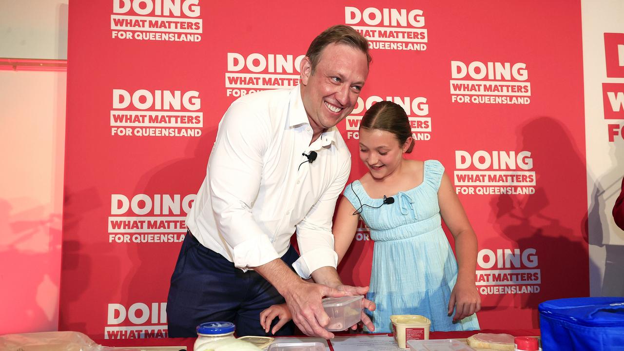 Premier Steven Miles makes a sandwich with his daughter Bridie. Pic: Adam Head