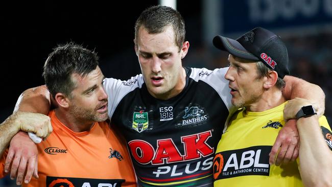 Isahh Yeo is helped off the field after his clash with Jason Taumalolo.