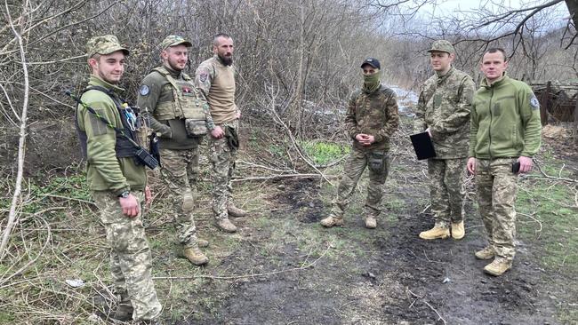 Lieutenant Vyacheslav, right, commander of a howitzer unit, insists Ukraine’s tactics in defence of Bakhmut are working