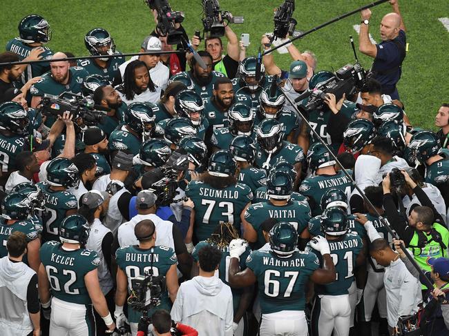 The Philadelphia Eagles huddle prior to the start of Super Bowl LII against the New England Patriots at US Bank Stadium on February 4, 2018 in Minneapolis, Minnesota. Picture: AFP