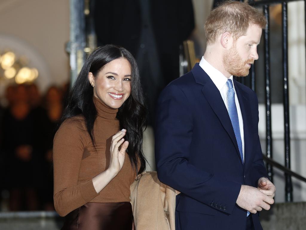 Britain's Prince Harry and Meghan, Duchess of Sussex, were all smiles days before announcing they’d be 'stepping back' as senior UK royals. Picture: Daniel Leal-Olivas via AP