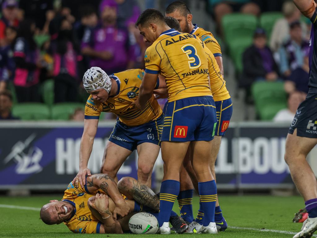 Ray Stone is left clutching at his knee after scoring the game-winning try. Picture: NRL Photos