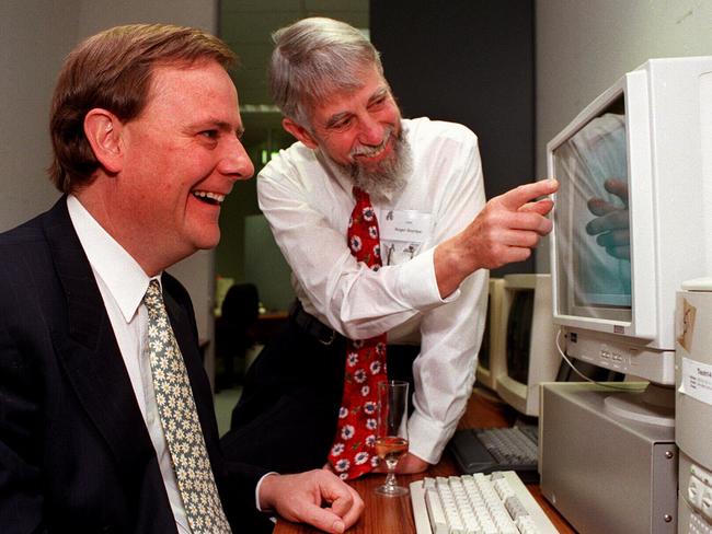 Former federal treasurer Peter Costello and Roger Riordan, MD and founder of Cybec at the opening of their new office in 1997.