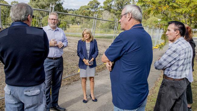 Deputy mayor Donna Gates and Coomera MP Michael Crandon speak with concerned residents at the site of the new ambulance station. Picture: Jerad Williams.