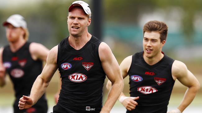 Jake Stringer warms up at Essendon training. Picture: Michael Klein