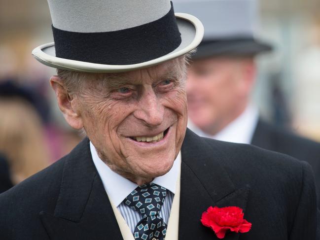 Britain’s Prince Philip, Duke of Edinburgh greets guests at a garden party at Buckingham Palace in London on May 16, 2017. Picture: AFP