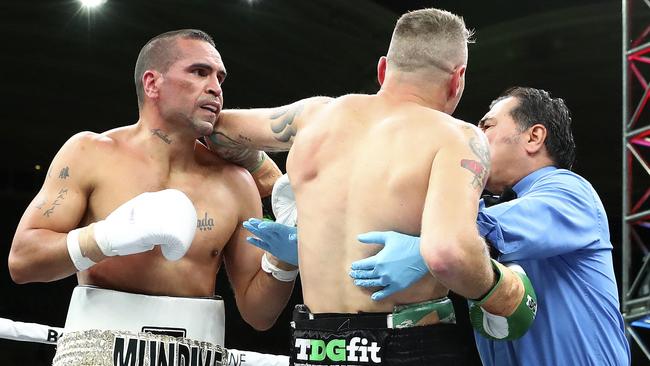 Danny Green stumbles after Anthony Mundine’s late punch. Picture: Sarah Reed