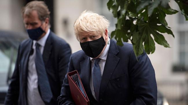 Britain's Prime Minister Boris Johnson wears a protective face covering as he arrives at the BBC in central London. Picture: AFP