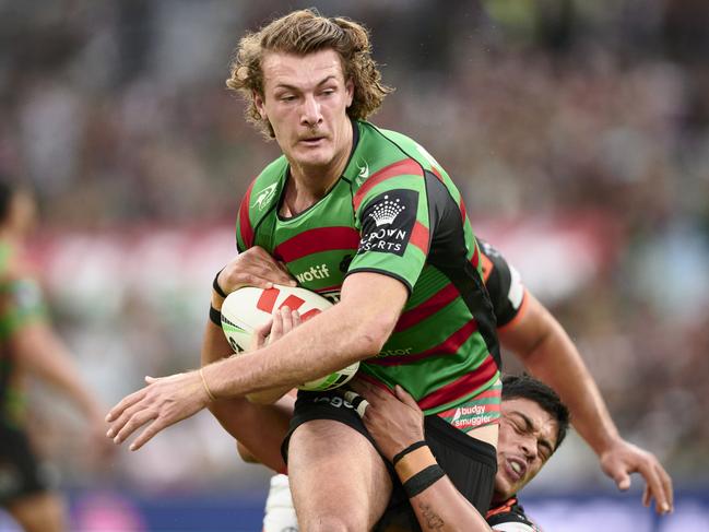 SYDNEY, AUSTRALIA - MAY 13: Campbell Graham of the Rabbitohs is tackled during the round 11 NRL match between South Sydney Rabbitohs and Wests Tigers at Accor Stadium on May 13, 2023 in Sydney, Australia. (Photo by Brett Hemmings/Getty Images)