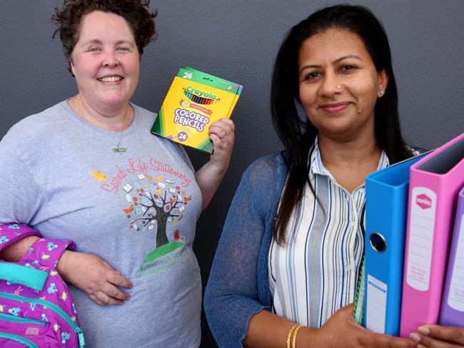 Natalie Wall and Moni Habib with some donated items.