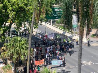 About 50 climate protesters, including Brisbane councillor Jonathan Sri, blocked the gates of the parliamentary annexe. Picture: Hayden Johnson